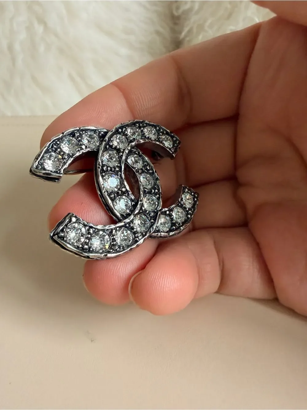 CHANEL double brooch